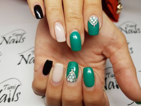Beautiful colorful nails and hand manicure.のeditorial素材