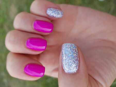 Beautiful colorful nails and hand manicure.のeditorial素材