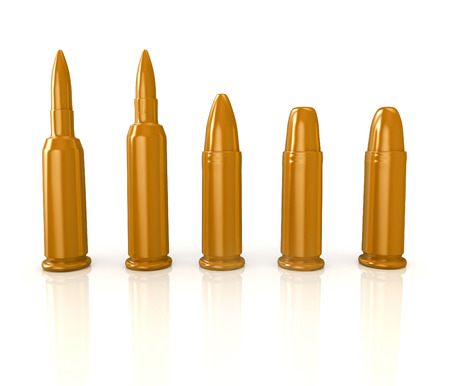 3d shiny and glossy bullets isolated on white backgroundの写真素材