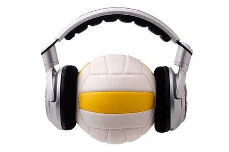 Headphones on a volleyball ball, sport and music conceptの写真素材