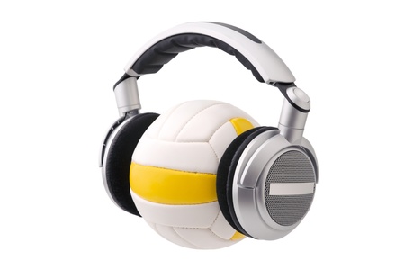 Headphones on a volleyball ball, sport and music conceptの写真素材
