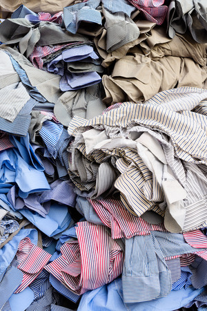 Backgrounds and textures: heap of unfinished shirts, textile abstractの写真素材