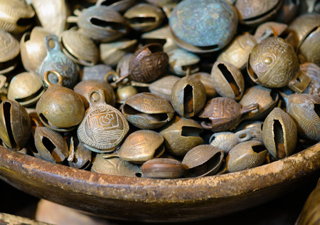 Backgrounds and textures: assorted brass jingles, antique abstractの写真素材
