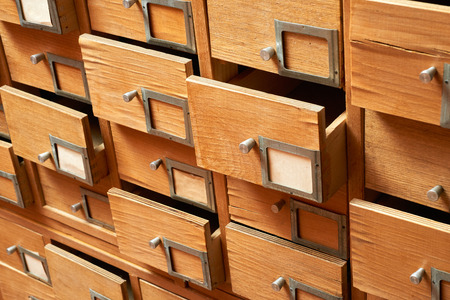 Backgrounds and textures: very old wooden cabinet with drawersの写真素材