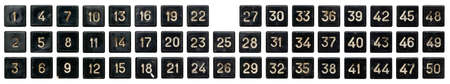 Very old numeric keypad, set of black plastic buttons, numbered from 1 to 50, isolated on white...