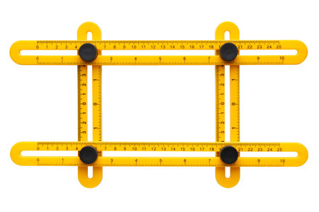 Yellow plastic four-angled ruler, creative picture frame or border, isolated on white background