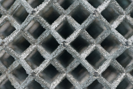 Openwork three-dimensional lattice, matrix, shallow depth of field, abstract modern technology concept backgroundの写真素材