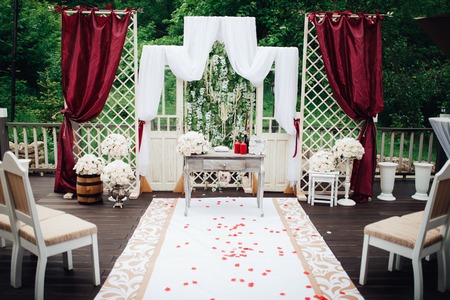 Beautiful wedding decoration set up with flowers.の写真素材