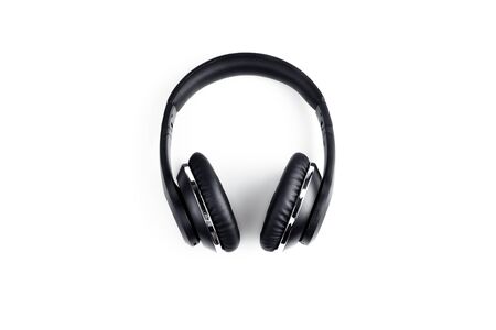 Black stylish professional wireless headphone on white background. High-quality music studio...