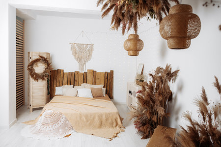 Photo of interior design spacious bright studio in Scandinavian style and warm pastel white and beige colors.の写真素材