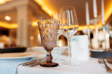 Photo of empty glasses in restaurant.の写真素材