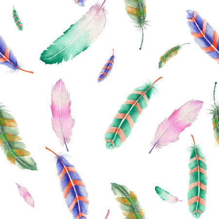 Seamless pattern of colored feathers painted with watercolors on a white backgroundの写真素材