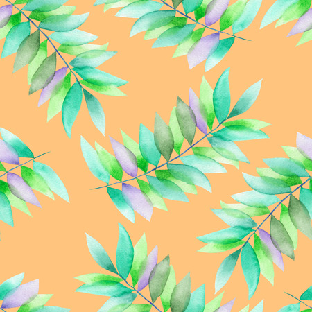 A seamless floral pattern with the green and violet leaves on the branches, hand-drawn in a watercolor on a tender orange backgroundの写真素材
