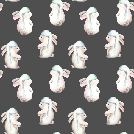 Seamless pattern with watercolor rabbits in nightcaps, hand drawn isolated on a dark backgroundの写真素材