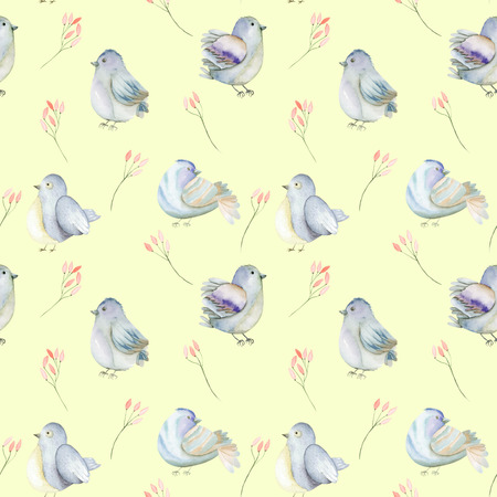 Seamless pattern of the watercolor blue birds and pink flowers branches, hand drawn on a yellow backgroundの写真素材