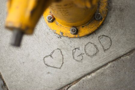 Love God Scrawled Into Concrete
