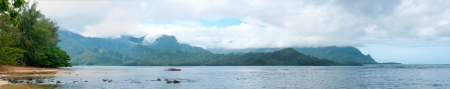 A panoramic shot of Hanalei Bay on the Island of Kauai in Hawaiiの写真素材