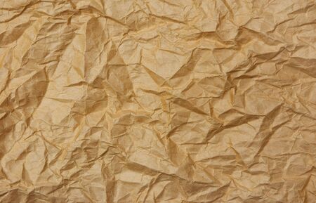 Brown crumpled paper background textureの写真素材
