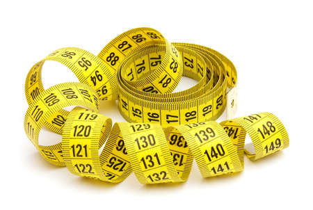 Yellow measuring tape isolated on white background