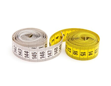Yellow and white measuring tape isolated on white background 