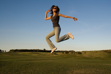 Jumping womanの写真素材