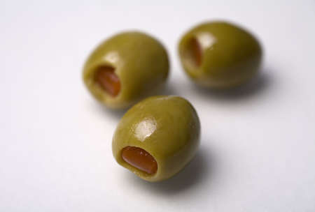Green stuffed olives - macro shotの写真素材