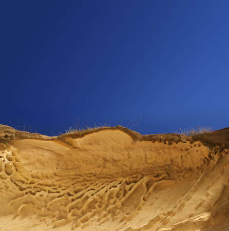 Yellow hill and blue sky