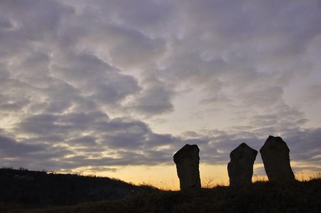 Three stones at the sunsetの写真素材