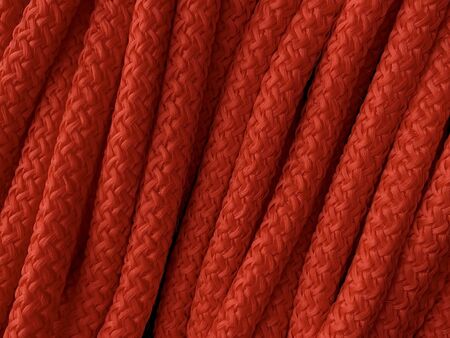 Background texture: bright nylon rope. Tight industrial rope, closeup.の写真素材