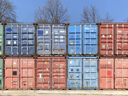Metal, industrial, multi-colored containers for transportation on ships. Stack of cargo containers...