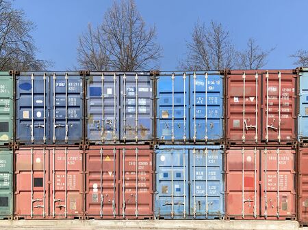 Metal, industrial, multi-colored containers for transportation on ships. Stack of cargo containers...