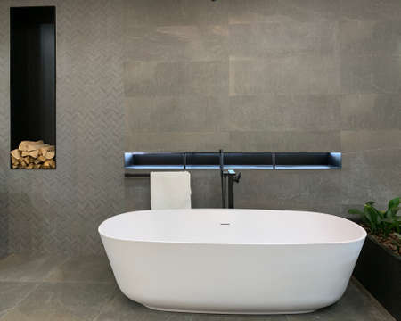 Modern bathroom interior design. Stylish plumbing in the design of a new home. Plumbing store, Kiev, April 30, 2020.のeditorial素材