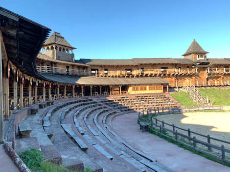 Wooden fortress wall against the sky. Medieval fortress with high walls. Wooden installation in the style of an ancient city. Park "Kievan Rus" Kiev region, Obukhov district, village Kopachevo, May 10, 2021.の写真素材