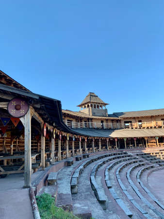 Wooden fortress wall against the sky. Medieval fortress with high walls. Wooden installation in the style of an ancient city. Park "Kievan Rus" Kiev region, Obukhov district, village Kopachevo, May 10, 2021.の写真素材