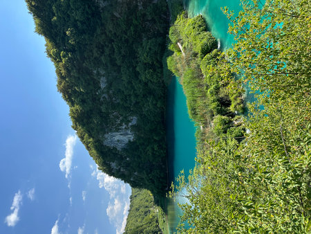 Experience the beauty of Plitvice Lakes in Croatia, where clear turquoise waters harmonize with cascades of waterfalls surrounded by vibrant nature and lush mountains, perfect for summer exploration.の写真素材