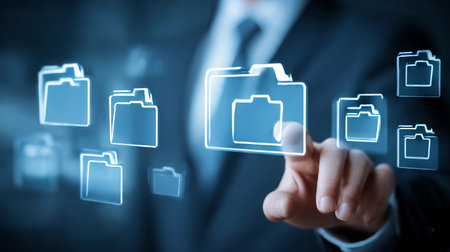 Business professional interacting with digital file management system in a modern office environmentの素材