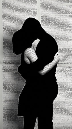 Couple embracing with shadowed silhouettes against a backdrop of printed text, symbolizing love and connectionの写真素材