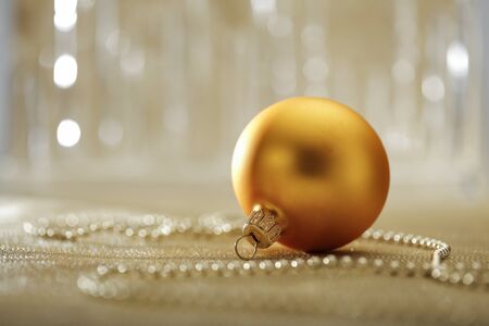 Christmas decorations in bright shiny colors with Christmas lights with blurred background.の写真素材