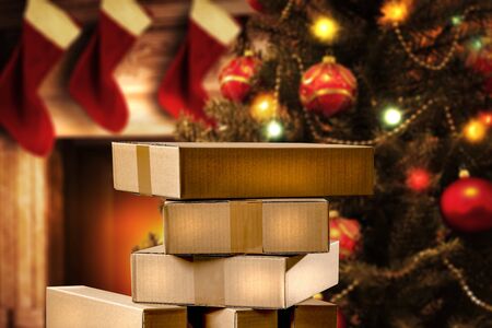 Wooden table top with space for products and decorations and christmas presents background. Gift...
