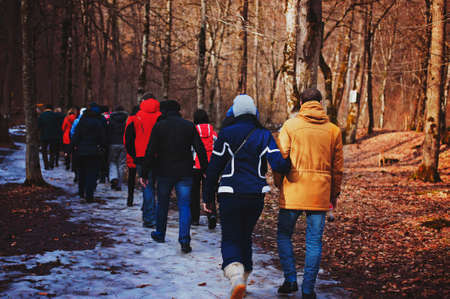 landscape of mountains covered with snow, and a group of mountain guides,の写真素材
