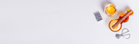 cigar, ashtray, cigarette scissors, lighter whiskey glass white concrete table. Smoke drink Scotch Bourbon wineの写真素材