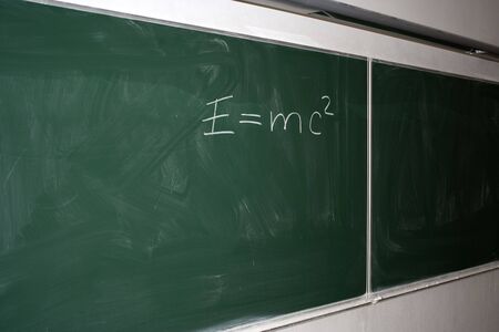 Classroom with green blackboard at university or collegeの写真素材