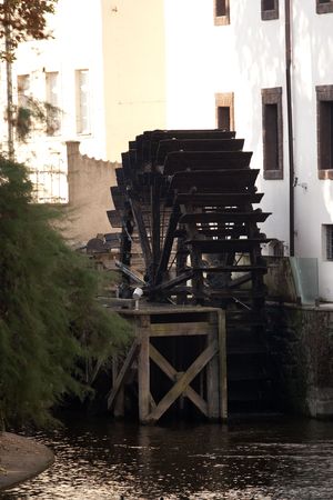 Wooden mill-wheel and the race