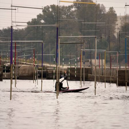 Water sportsman in kayak on training canalの写真素材