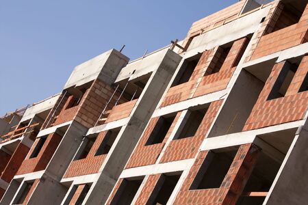 Construction site - building a large brick block of flats