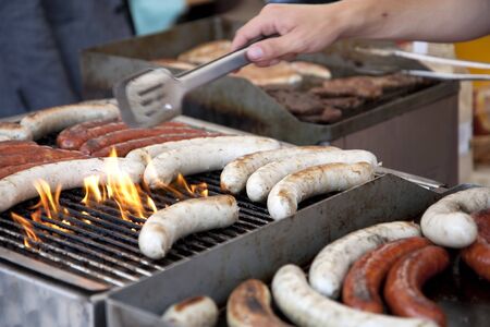 Sausages on grill - street fast-foodの写真素材