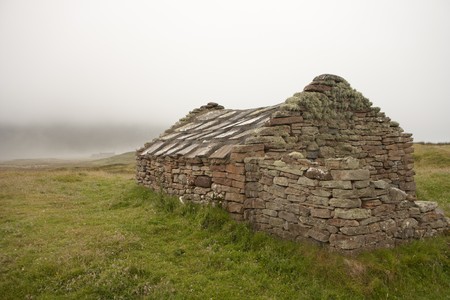 Hut of stone on an Orkney islandの写真素材