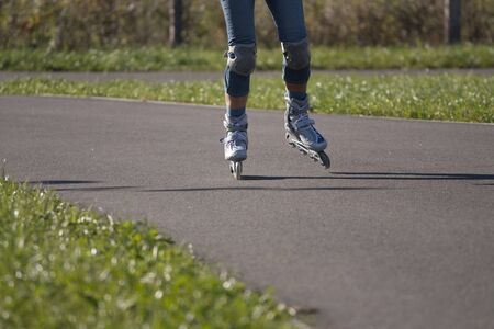 Roller skater - jogging alone in park