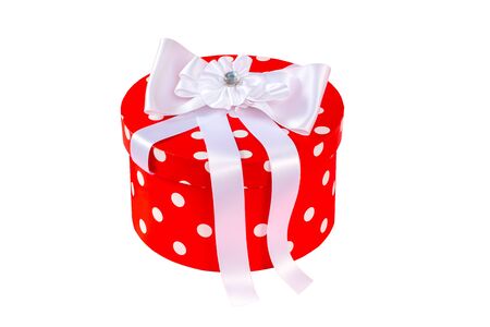 Gift box with colored ribbon as a gift for Christmas, New Year, Mothers Day, anniversary, birthday, party, isolated on a white background, top view. Gift to a colleague at workの写真素材