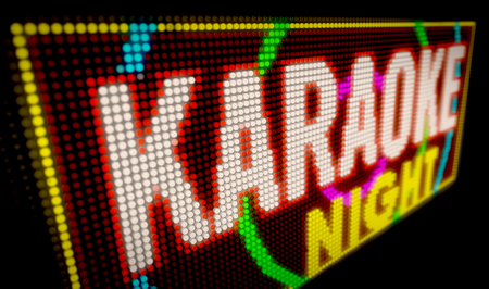 Karaoke night sign neon. Big illuminated letters built of light bulbs LED 3D illustration.の写真素材